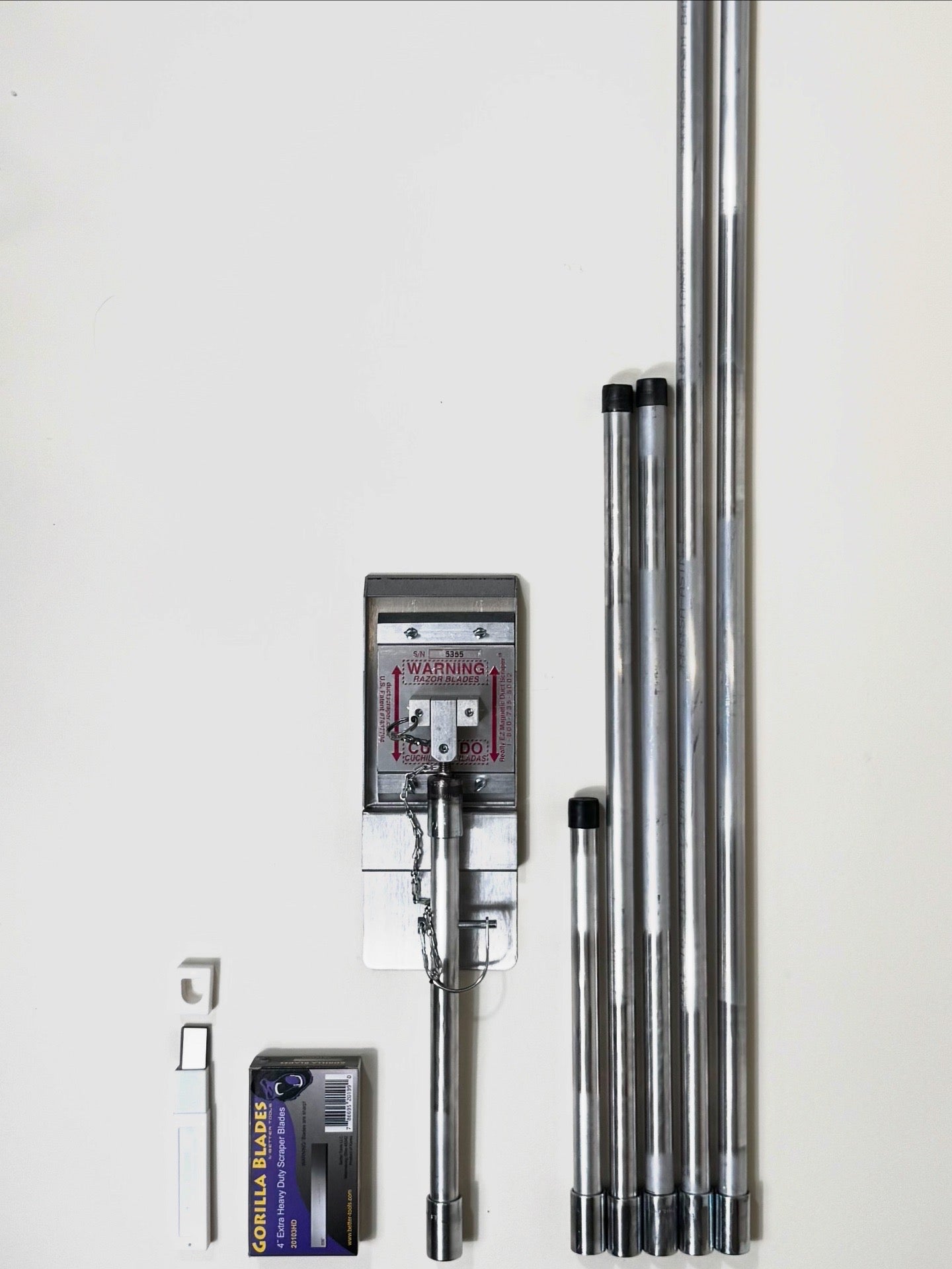 Magnetic scraper for kitchen exhaust cleaning