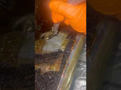 Sharp scraper cutting through restaurant grease